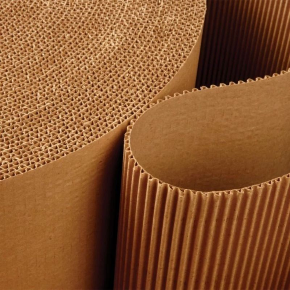 Corrugated cardboard stock used for durable packaging boxes.
