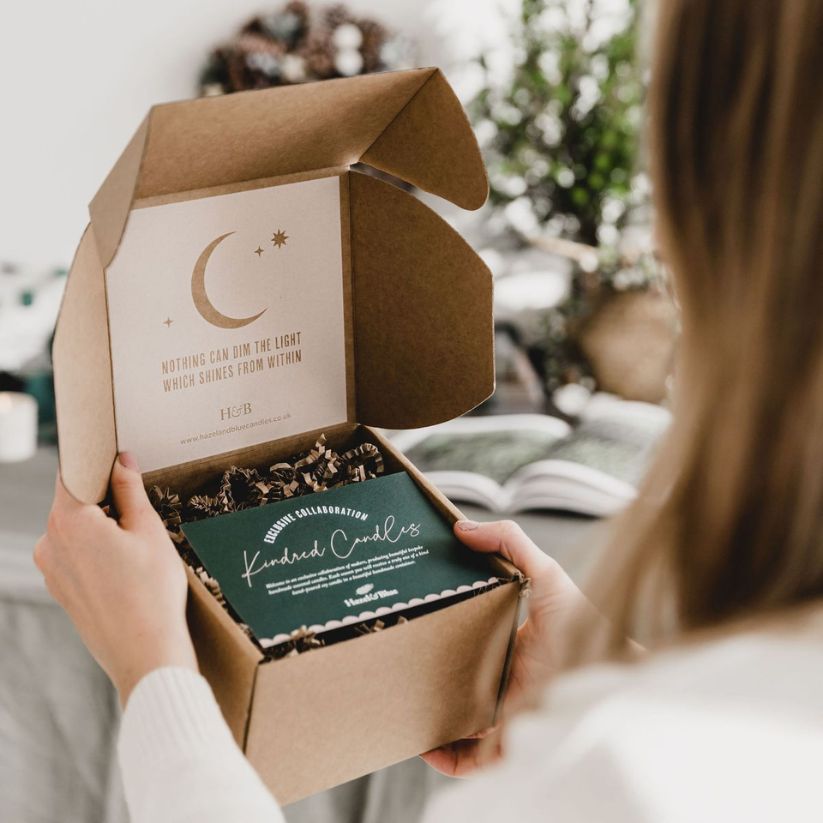 Corrugated kraft candle subscription box.