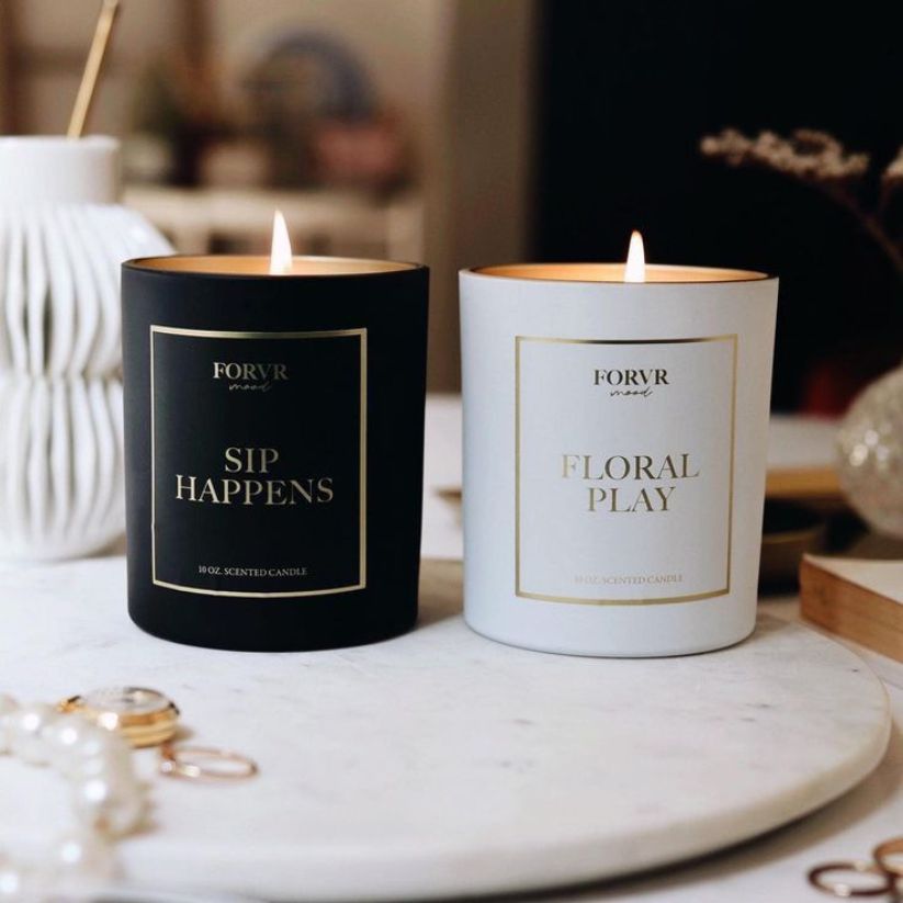Custom printed candle jar label with logo on glass candle container.