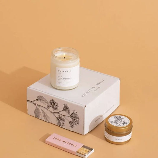 Custom candle subscription box with branded packaging for monthly candle delivery.