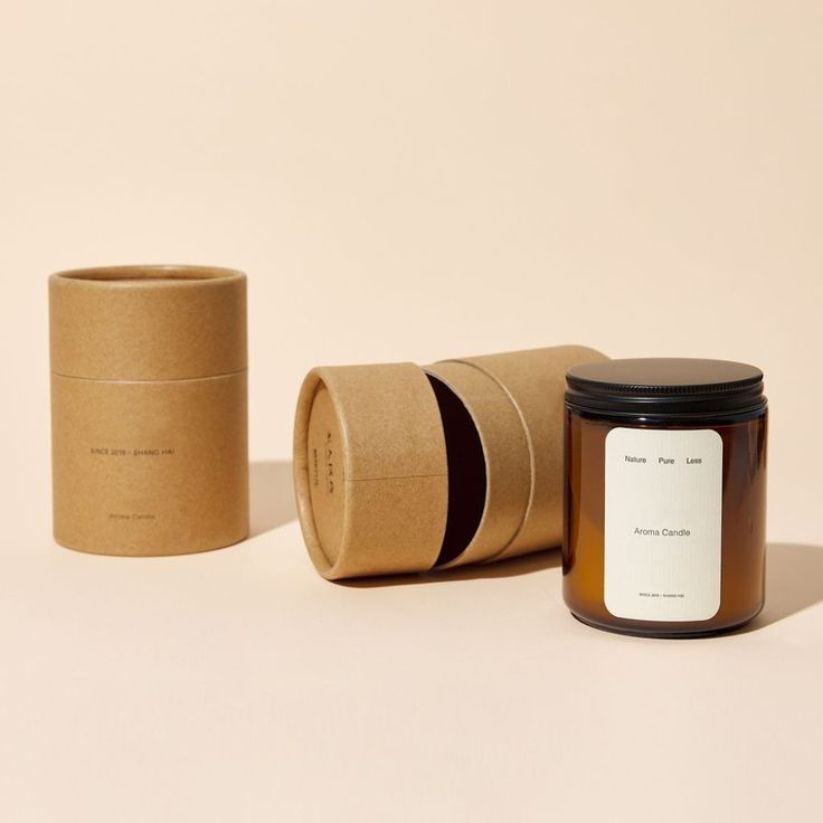 Eco-friendly kraft candle boxes with custom logo printing and recyclable brown packaging for retail candles.