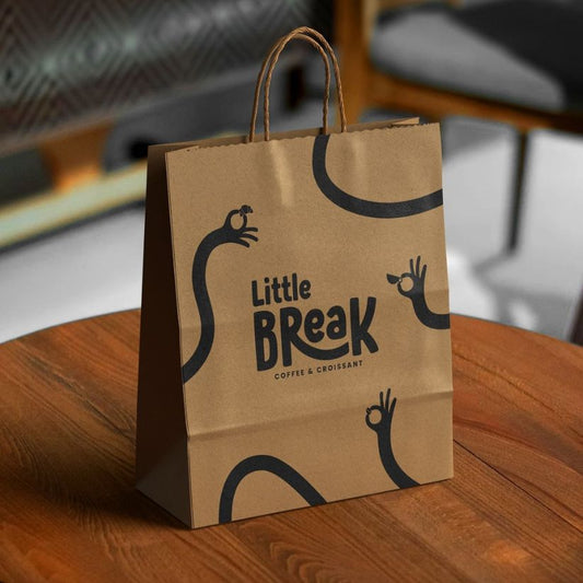 Custom kraft paper bag with logo printing for retail, boutique, and gift packaging.