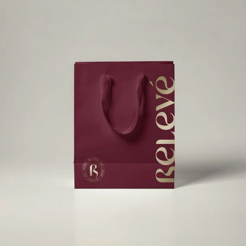 Custom printed luxury paper bag with high-quality paper and elegant design for retail stores.