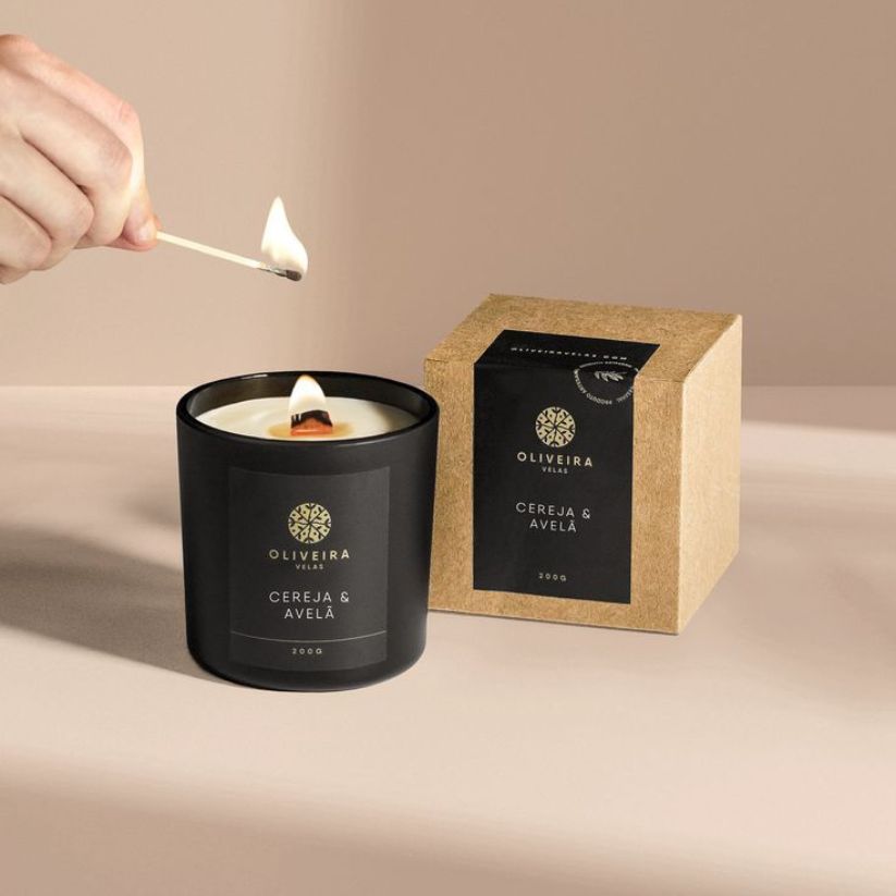 Foil stamped candle jar label with gold detailing on luxury glass candle container.