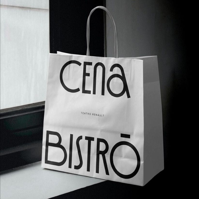 Premium twisted handle paper bag with sturdy construction and stylish design for gift packaging.